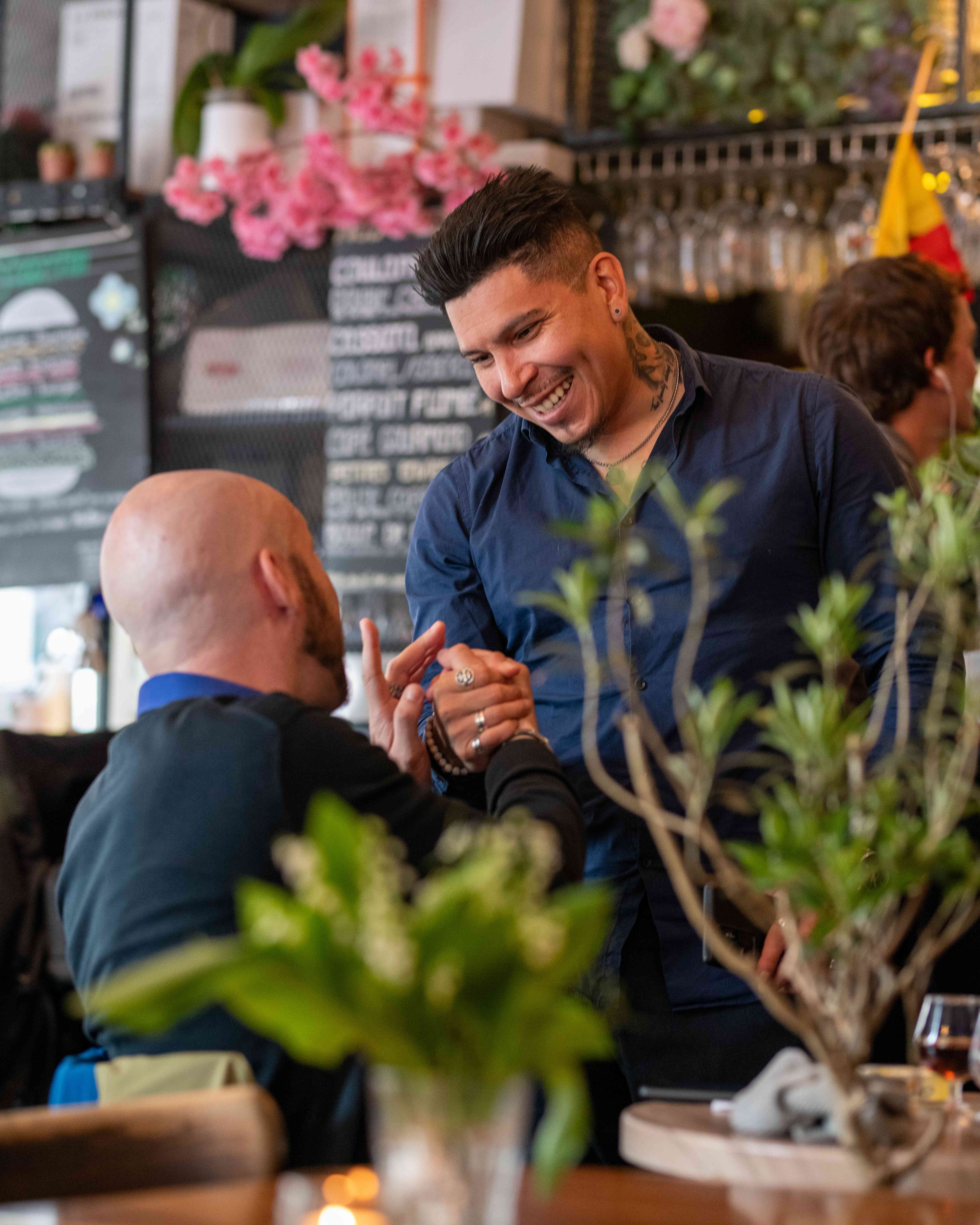Friendly service interaction at Le Bistro
